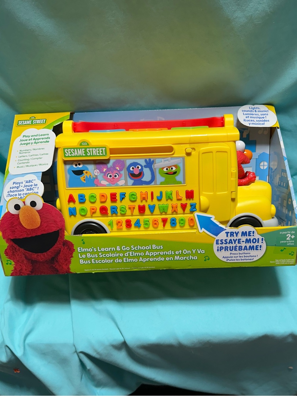 Sesame Street Yellow Learn & Go School Bus Toy with Red Handle